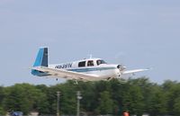 N9391V @ KOSH - Mooney M20C - by Mark Pasqualino