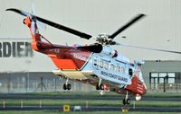 EI-ICR @ EGAC - Irish Coastguard helicopter returning to Dublin after delivering a casualty to a waiting ambulance.