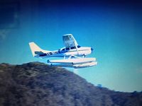 ZK-MCG - We were cruising up the east coast of the Abel Tasman National Park on February 25, 2015.  ZK MCG took off right past our boat.  I video taped it and took a screen shot of closest the aircraft was to us. - by David K MacDonald