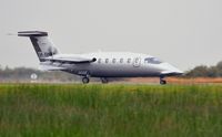 M-ONTE @ EGFH - Visiting P180 Avanti II operated by Scotia Aviation departing a wet Runway 04. - by Roger Winser
