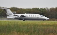 M-ONTE @ EGFH - Visiting P180 Avanti II operated by Scotia Aviation departing a wet Runway 04. - by Roger Winser