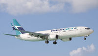 C-FUSM @ TNCM - Westjet landing at TNCM - by Daniel Jef