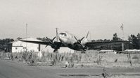 N54510 @ O88 - C-46 parked on the ramp at the old Rio Vista Airport in California. 1980. - by Clayton Eddy