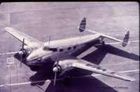 N18137 @ MKC - My father was a noted aviation historian. This photo is part of his vast collection. I thought you might like to see it when this plane was fairly new. I do not know the airport, but my guess is Kansas City. - by Janet Betts Dean
