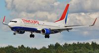EI-RUR @ EGHH - Arriving for repaint - by John Coates