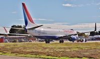 EI-RUR @ EGHH - Arriving at paintshop for repaint - by John Coates