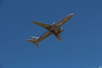 N945AN @ KSEA - Shortly after departing from one of the south facing runways. - by Anonymous