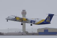 N441QX @ KBOI - Painted with Alaska State logo. Taking off on RWY 10L as the snow starts to fall.