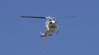 N488DF - CalFire Chopper 305 passes overhead before picking water up from a nearby pond in support of a Riverbed Fire on the Jurupa Valley/Riverside City line. - by Matthew P