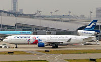 OH-LGB @ RJBB - McDonnell-Douglas MD-11 [48450] Osaka-Kansai~JA 03/11/2005 - by Ray Barber