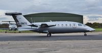 M-ONTE @ EGHH - Taxiing to depart - by John Coates