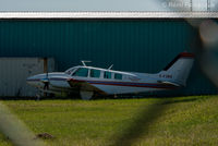 C-FJBD @ CYYE - Parked next to Villars Air hangar. - by Remi Farvacque