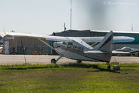 C-FQRX @ CYYE - Parked in private hangar area. - by Remi Farvacque