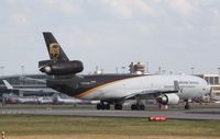 N260UP @ KDFW - MD-11F - by Mark Pasqualino