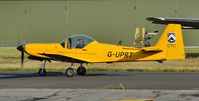 G-UPRT @ EGHH - Resident taxiing to Fast Avn - by John Coates