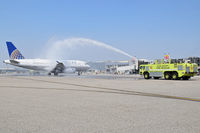 N855UA @ KBOI - Receiving a water welcome having several Olympic winners on board. - by Gerald Howard