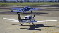 N511MC @ LVK - N511MC and N18906 on the Livermore Airport ramp. - by Clayton Eddy