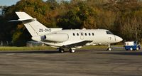 ZS-DAD @ EGHH - Just painted all white at JETS and re-reg'd from G-MAXP - by John Coates