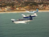 VH-YVE - M22 in formation with 2 M20J's - by public domain