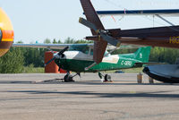 C-GEKU @ CYYE - Parked by private hanger, east side of airport.