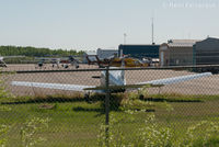 C-GIZH @ CYYE - Parked very NE part of airport.