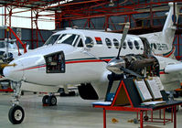D2-FFK @ FALA - Beech B200 Super King Air [BB-1026] (Tropicana) Lanseria~ZS 20/09/2006. Undergoing a overhaul in this tightly packed hangar. - by Ray Barber
