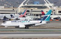 C-GSWJ @ KLAX - Boeing 737-700 - by Mark Pasqualino