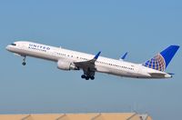 N595UA @ KLAX - United B752 departing. - by FerryPNL