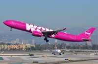 TF-LUV @ KLAX - WOW A333 departing for Iceland. - by FerryPNL