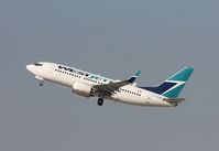 C-FWSK @ KLAX - Boeing 737-700 - by Mark Pasqualino