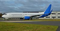 G-JZHM @ EGHH - Arrives in basic livery to be finished in full Holidays colours - by John Coates