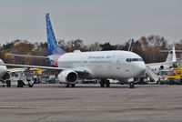 EI-FHB @ EGHH - Just painted at Airbourne Colours to Sriwijaya Air livery - by John Coates
