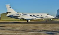 N542AP @ EGHH - Taxiing to depart - by John Coates