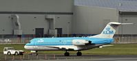 PH-KZT @ EGAC - KLM Cityhopper PH-KZT under tow.  Amsterdam departure cancelled. - by Albert Bridge