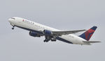 N129DL @ KLAX - Departing LAX on 25R - by Todd Royer