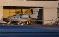 N105CX @ KVNY - This G5 spent the night partly inside the hangar. - by FerryPNL