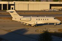 N508XJ @ KVNY - Xojet CL300 taxying for departure. - by FerryPNL