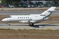 N613CF @ KVNY - Hawker 800 under tow. - by FerryPNL