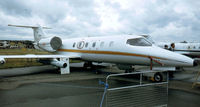 G-LEAR @ EGLF - At the 1984 Farnborough International Air Show. Scanned from slide. - by kenvidkid