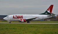 5N-AIS @ EGHH - Lining up to depart on delivery to Nigeria - by John Coates