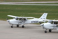 N740SP @ KIOW - Spied on the ramp, from the observation deck - by Glenn E. Chatfield