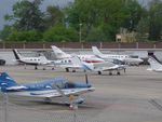 HB-EYP @ LSGG - Parked up - by Keith Sowter