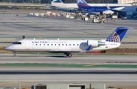 N910SW @ KLAX - United Express CL200 - by FerryPNL