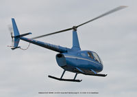 N54DW @ OCA - Robinson R-66Turbine on low fly by.