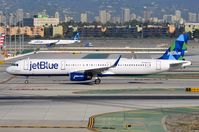 N929JB @ KLAX - Jetblue A321 rolling down the runway - by FerryPNL
