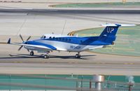 N834UP @ KLAX - Be350 waiting to cross the runways. - by FerryPNL