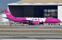 TF-GAY @ KLAX - WOW Air A333 under tow. - by FerryPNL