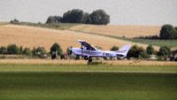 G-BKIJ @ DUXF - Took this at Duxford in England the day the Hawker Hunter went down at Shoreham Airshow nr Brighton UK.
I liked the picture so much that I spent some time improving it in Corel Photopaint. - by Mike W Goodwin