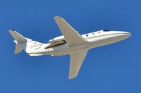 N457CP @ KLAS - Hawker 400A departing. - by FerryPNL