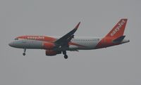 G-EZOY @ EGHH - Misty approach to 08 - by John Coates